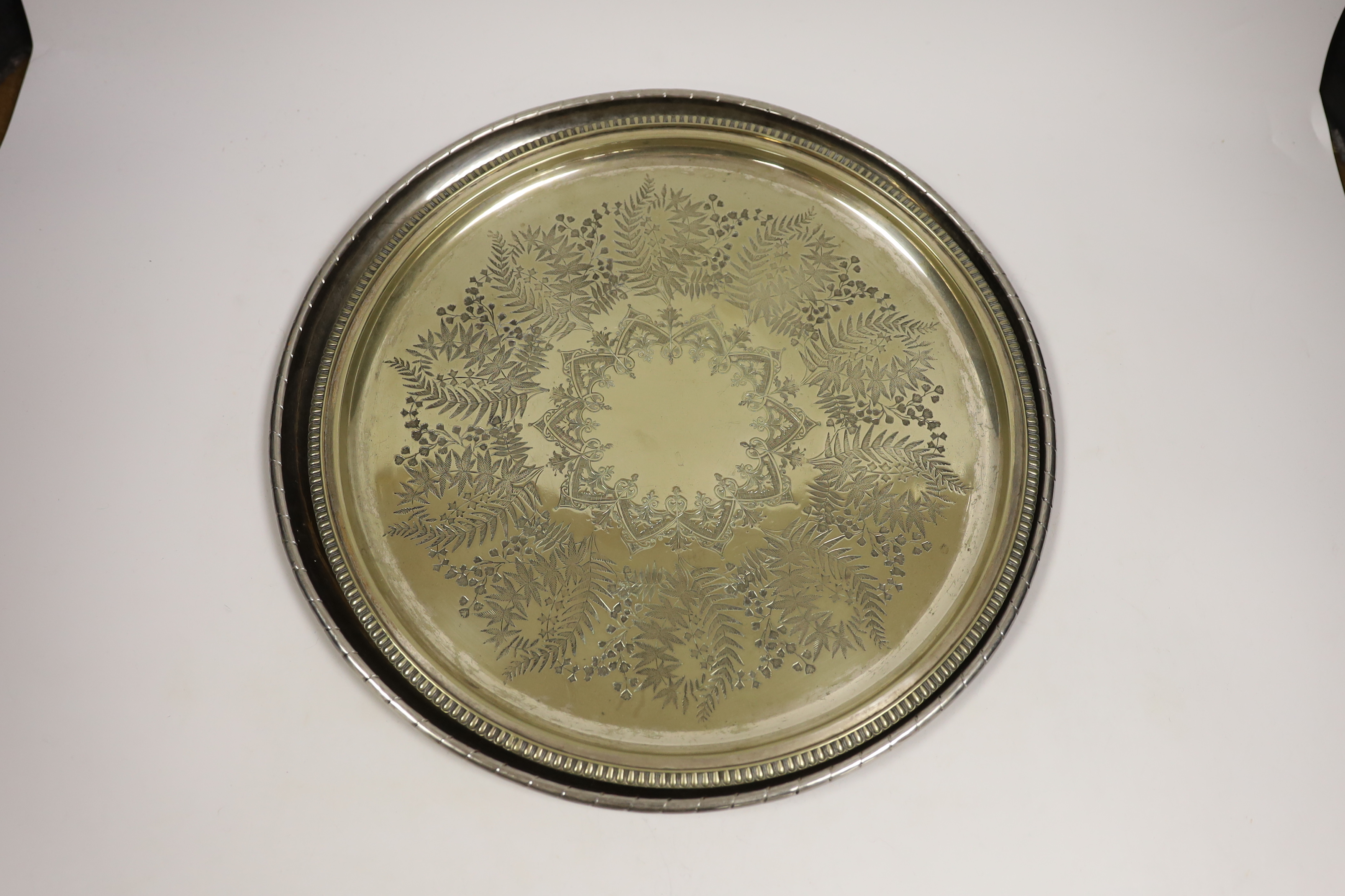 An Old Sheffield plate bowl, five cased napkin rings, and two salvers, largest 38cm diameter